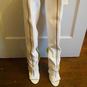 White thigh high boots with Gold zipped